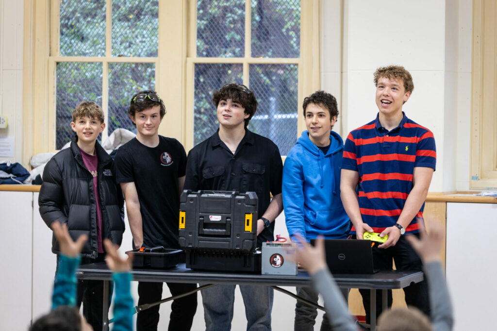 Students from SAAS Robotics demonstrate their robot