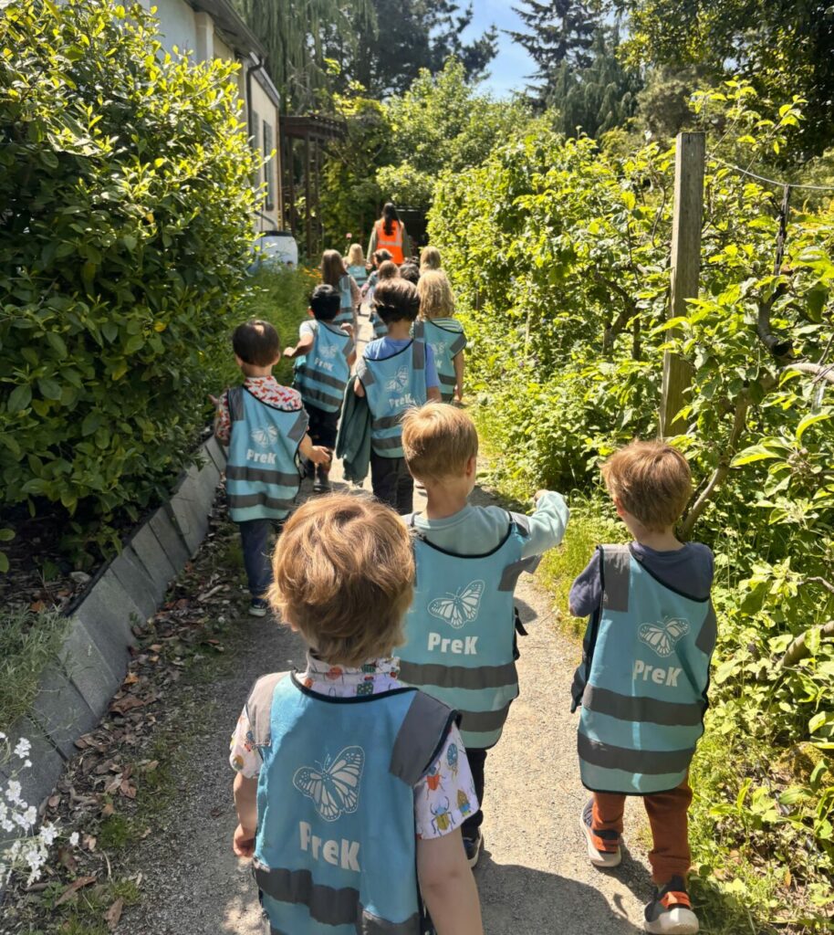 Pre-k students from The Meridian School take a tour of the neighboring nonprofit, Tilth Alliance.
