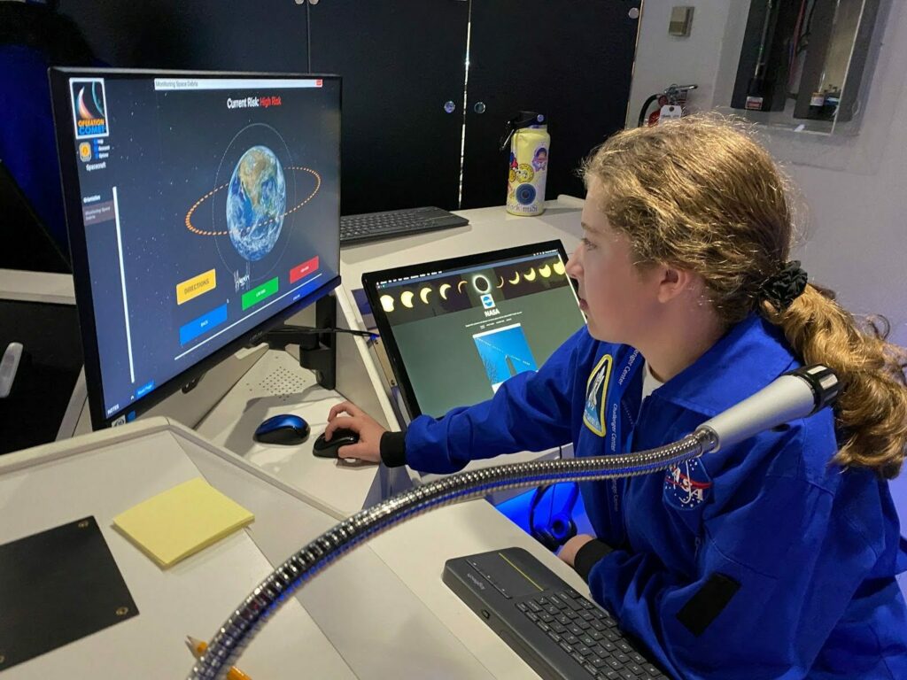 student in nasa outfit