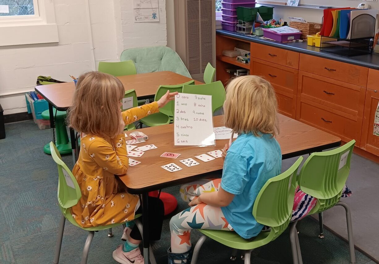 students sitting at desk doing math