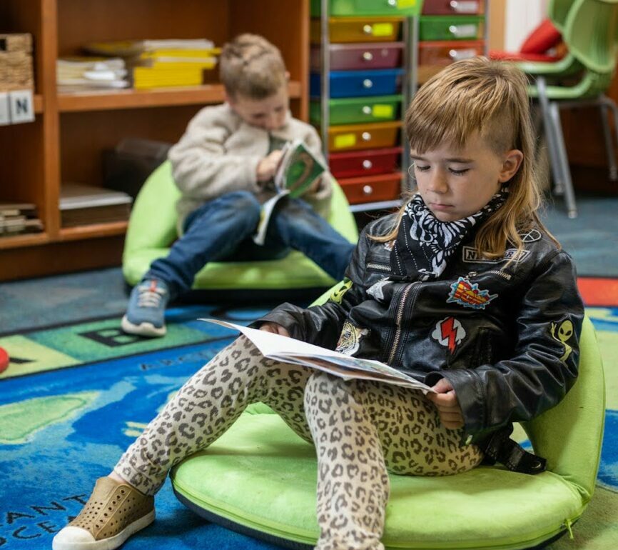 student sitting and reading