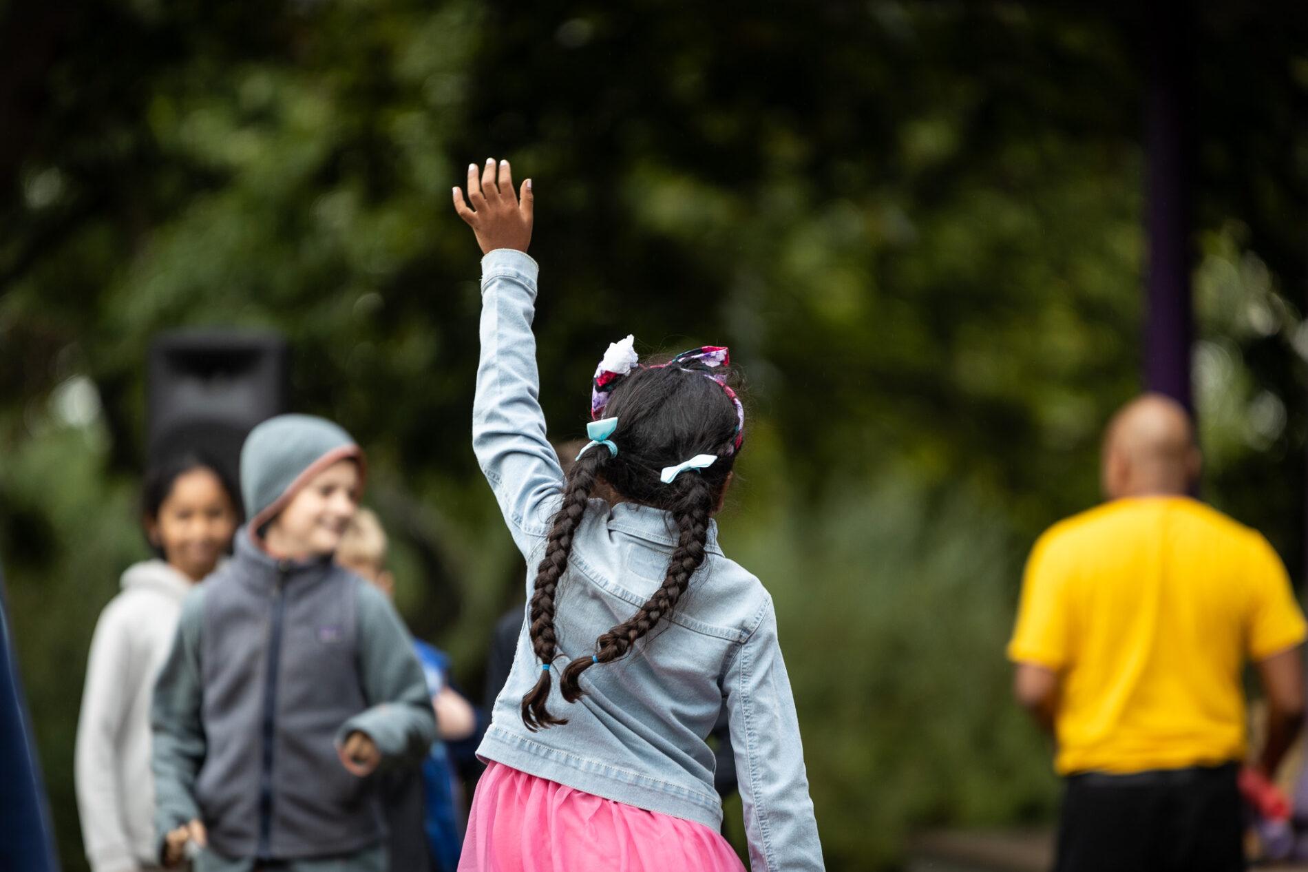 student raising hand