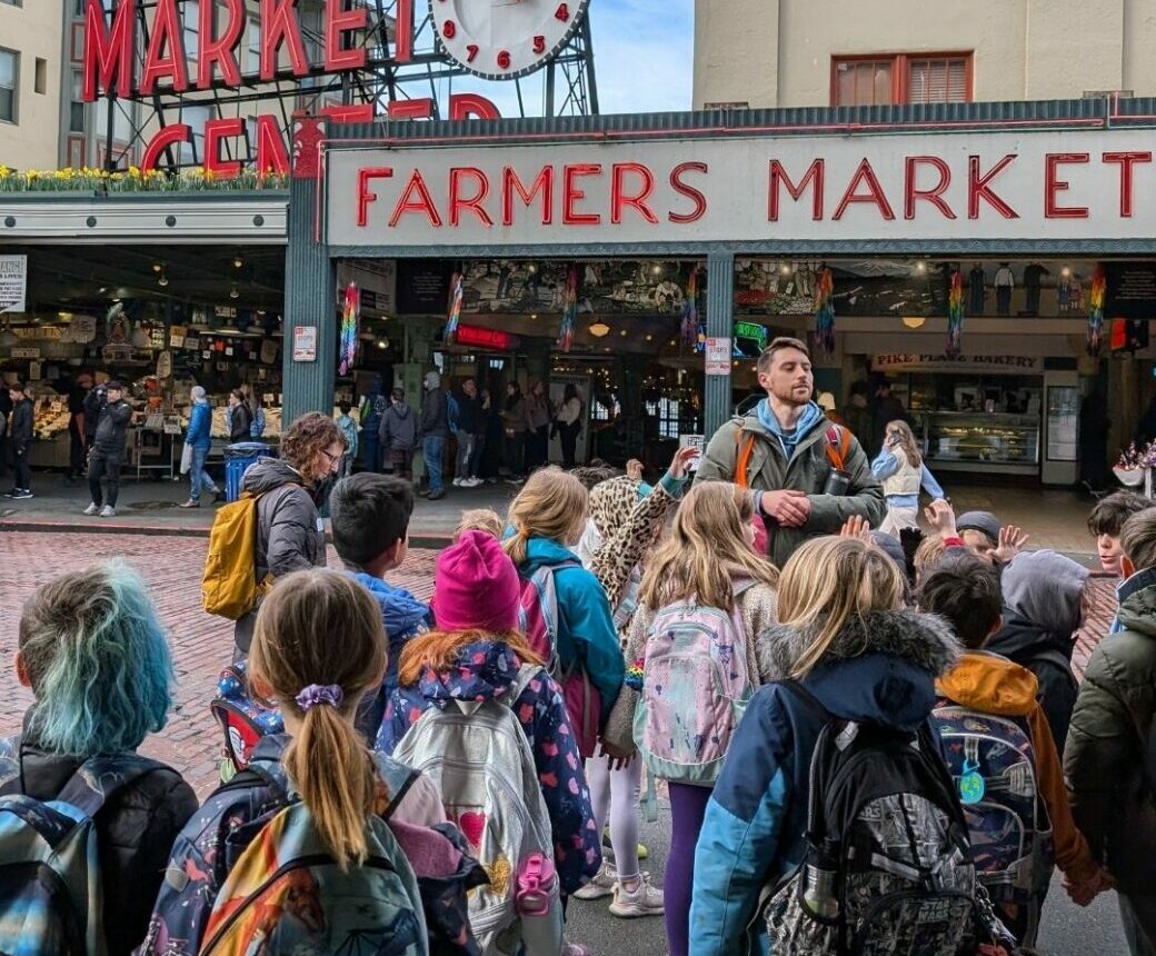 students at farmers market