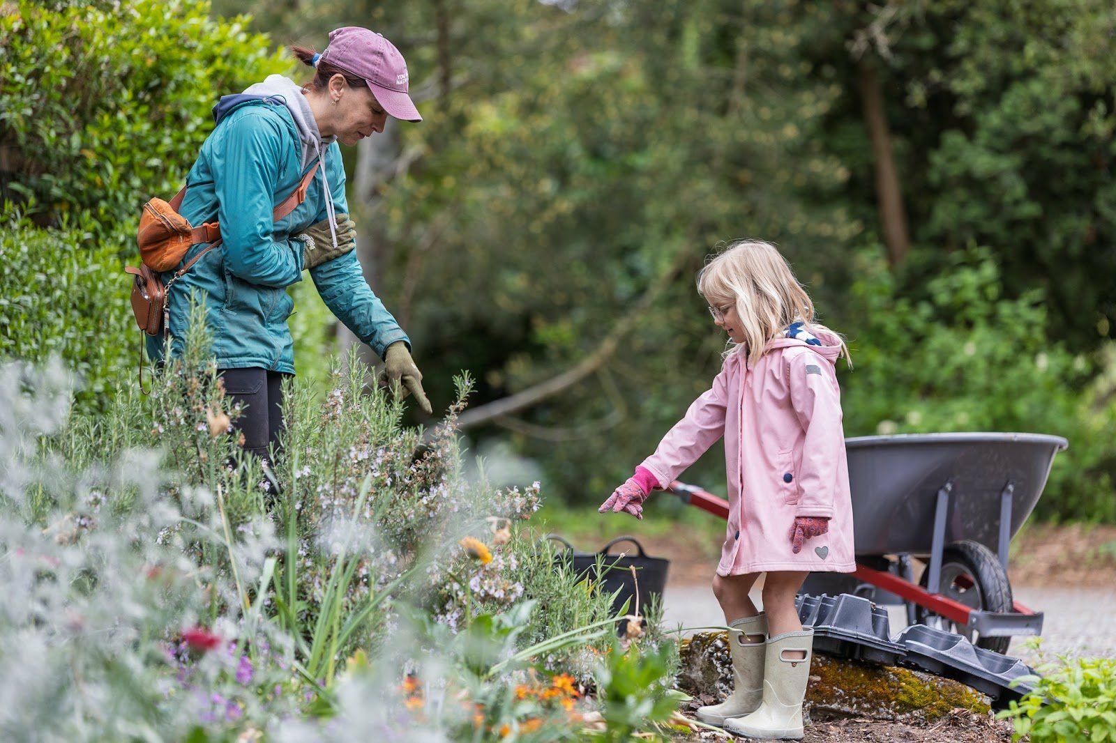 student and teacher outside in garden