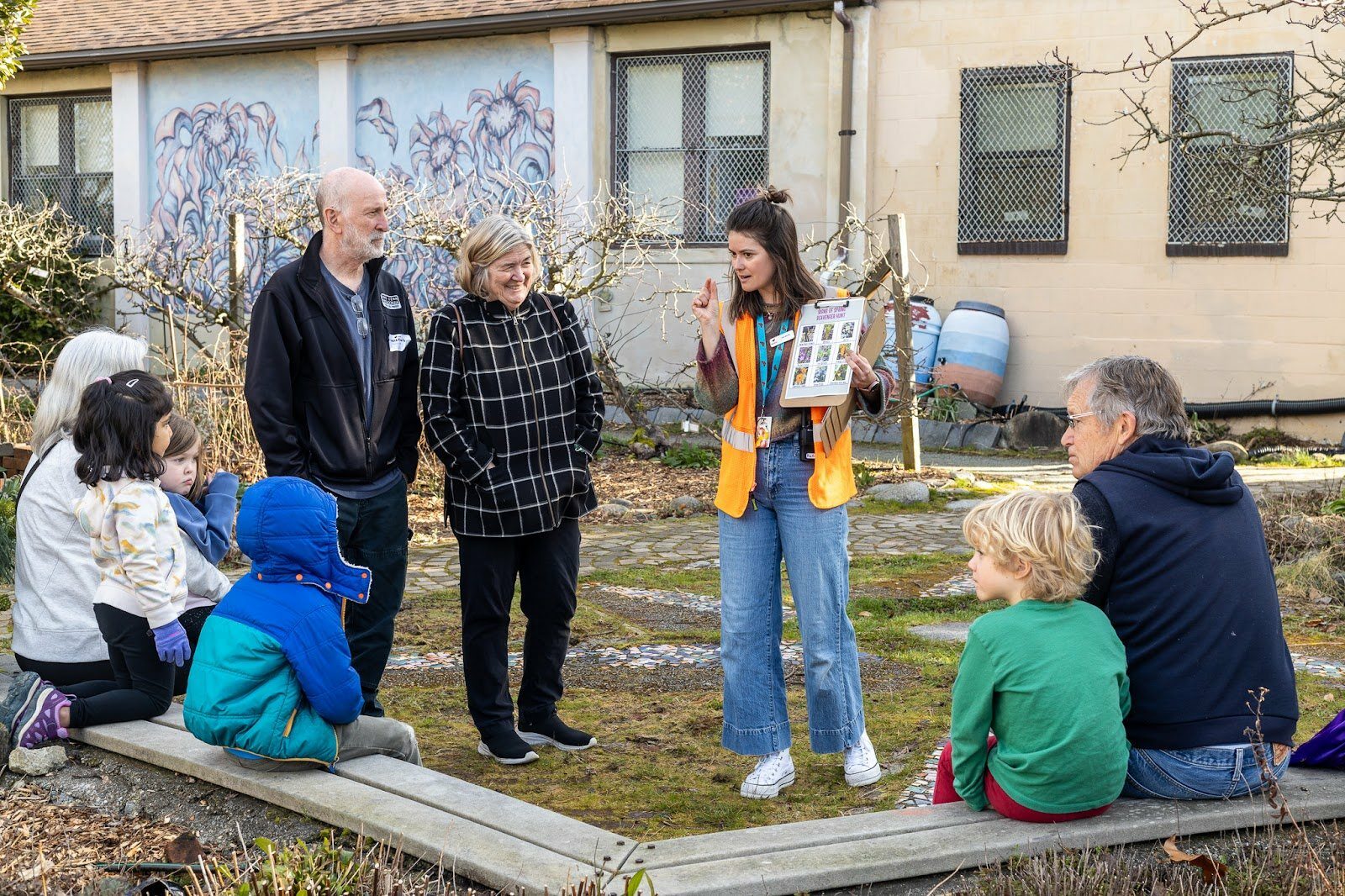 students outside sitting on bench