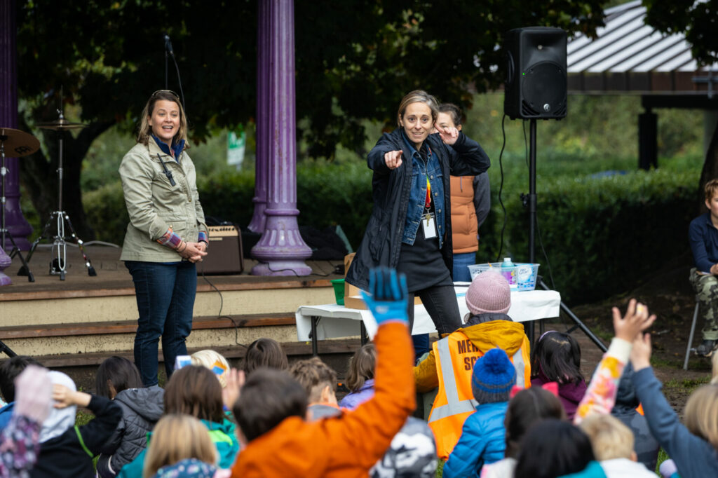 Teacher chooses a student to volunteer for a project.