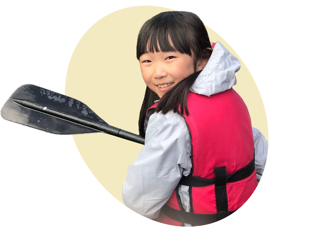 girl student with row paddle