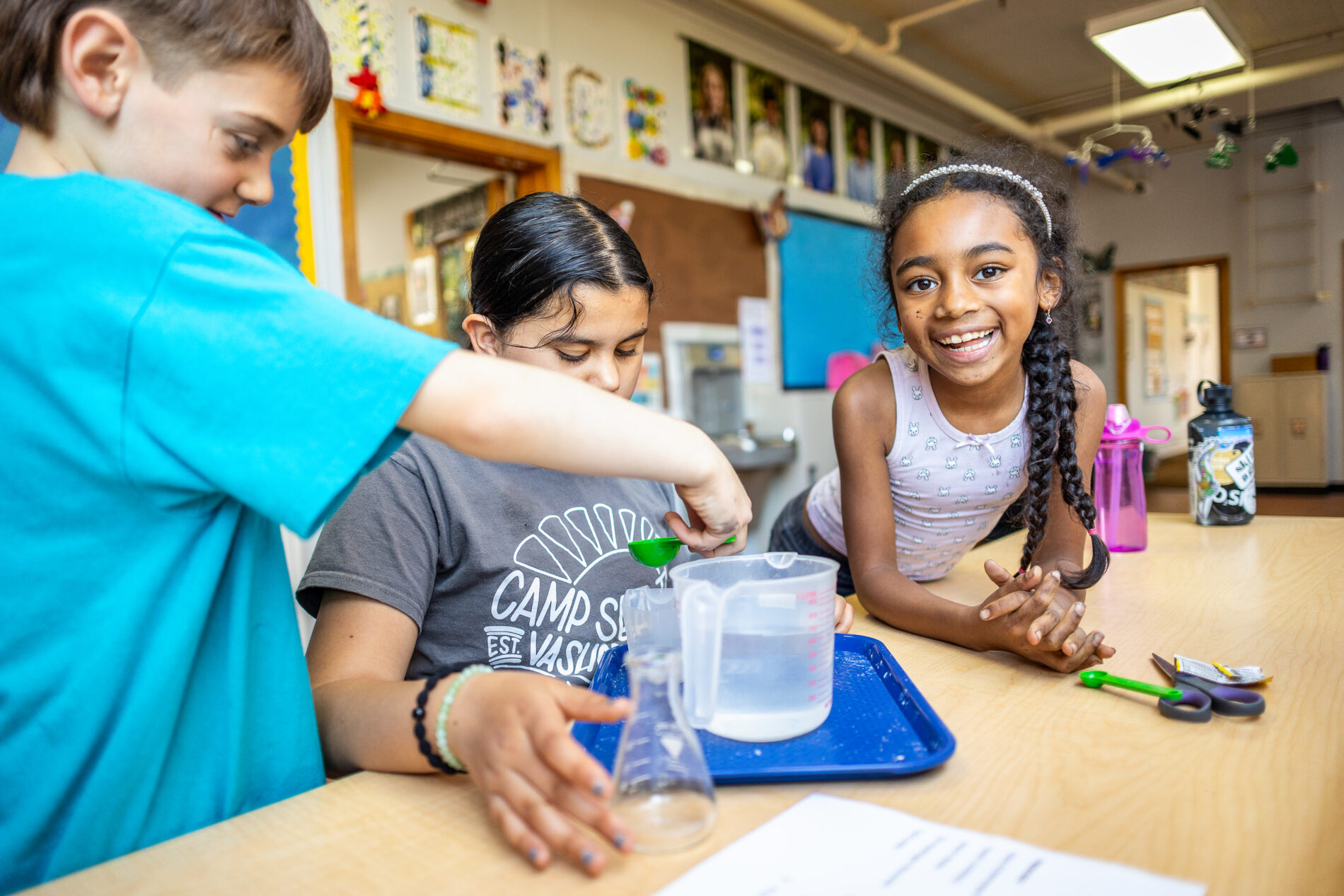 The Meridian School students have fun while doing a hands-on science project! This is one example of how our experiential and project-based approach to learning instills a love of learning in each child.