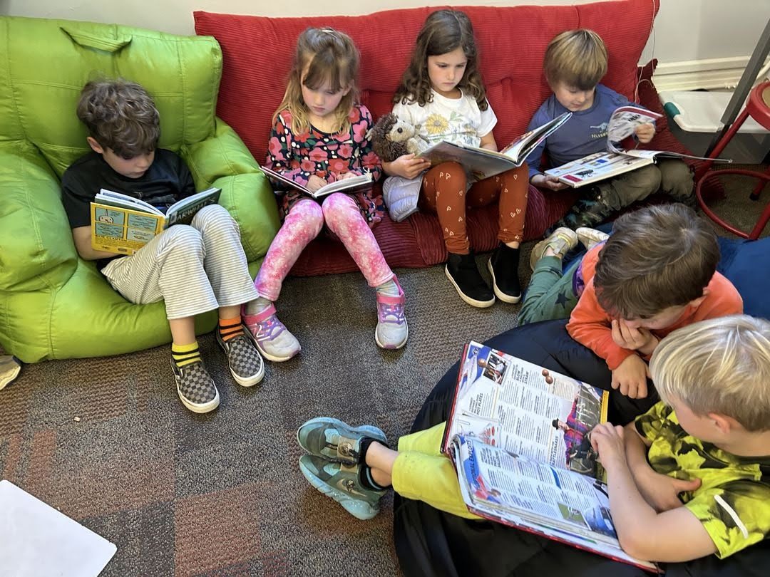 students reading sitting down